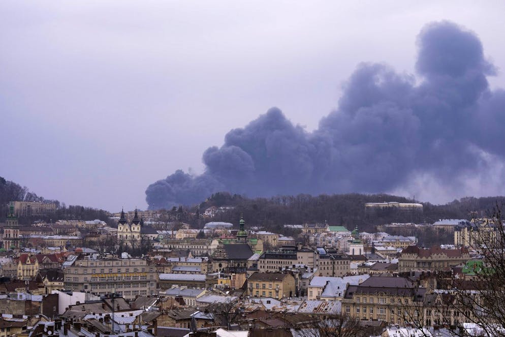 Smoke rises in the air in Lviv, western Ukraine, Saturday, March 26, 2022. With Russia continuing to strike and encircle urban populations, from Chernihiv and Kharkiv in the north to Mariupol in the south, Ukrainian authorities said Saturday that they cannot trust statements from the Russian military Friday suggesting that the Kremlin planned to concentrate its remaining strength on wresting the entirety of Ukraine's eastern Donbas region from Ukrainian control. (AP Photo/Nariman El-Mofty)