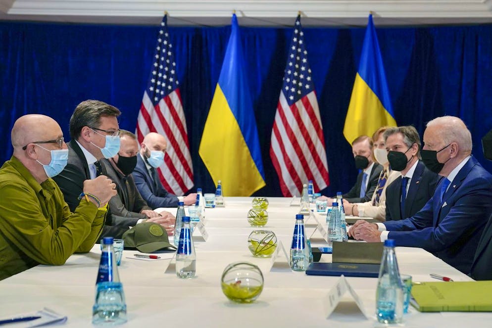 President Joe Biden participates in a meeting with Ukrainian Foreign Minister Dmytro Kuleba, second from left, and Ukrainian Defense Minister Oleksii Reznikov, left, Saturday, March 26, 2022, in Warsaw. Secretary of State Antony Blinken, second from right, looks on. (AP Photo/Evan Vucci)