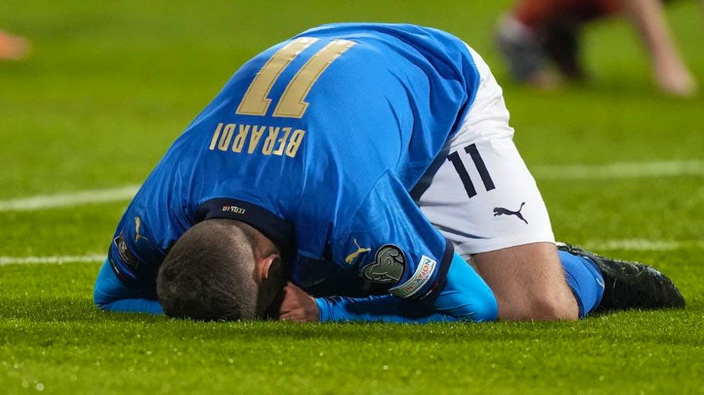 Italy's Domenico Berardi knees after missing a scoring chance during the World Cup qualifying play-off soccer match between Italy and North Macedonia, at Renzo Barbera stadium, in Palermo, Italy, Thursday, March 24, 2022. (AP Photo/Antonio Calanni)