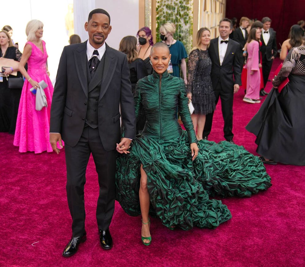 Will Smith, left, and Jada Pinkett Smith arrive at the Oscars on Sunday, March 27, 2022, at the Dolby Theatre in Los Angeles. (AP Photo/John Locher)
