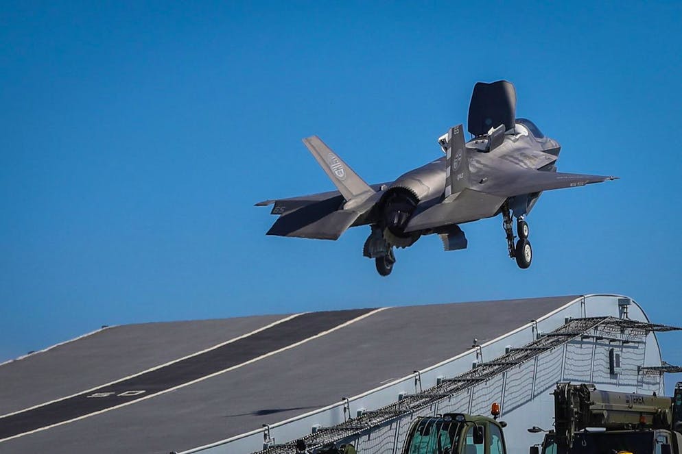 epa07055929 A handout picture provided by the British Ministry of Defence (MOD) showing Royal Navy Commander, Nathan Gray making the first ever F-35B Lightning II jet take off from, the British Royal Navy aircraft carrier, HMS Queen Elizabeth at sea on 26 September 2018, (issued 29 September 2018). the MOD report that two F-35B Lightning II fighter jets have successfully landed onboard HMS Queen Elizabeth for the first time, laying the foundations for the next 50 years of fixed wing aviation in support of the UKâÄ™s Carrier Strike Capability. Royal Navy Commander, Nathan Gray, 41, made history by being the first to land on, carefully manoeuvring his stealth jet onto the thermal coated deck. He was followed by Squadron Leader Andy Edgell, RAF, both of whom are test pilots, operating with the Integrated Test Force (ITF) based at Naval Air Station Patuxent River, Maryland. Shortly afterwards, once a deck inspection has been conducted and the all-clear given, Cdr Gray became the first pilot to take off using the shipâÄ™s ski-ramp. EPA/PO ARRON HOARE /BRITISH MINISTRY OF DEFENCE/HANDOUT MANDATORY CREDIT: CROWN COPYRIGHT HANDOUT EDITORIAL USE ONLY/NO SALES *** Local Caption *** Stills grab from video