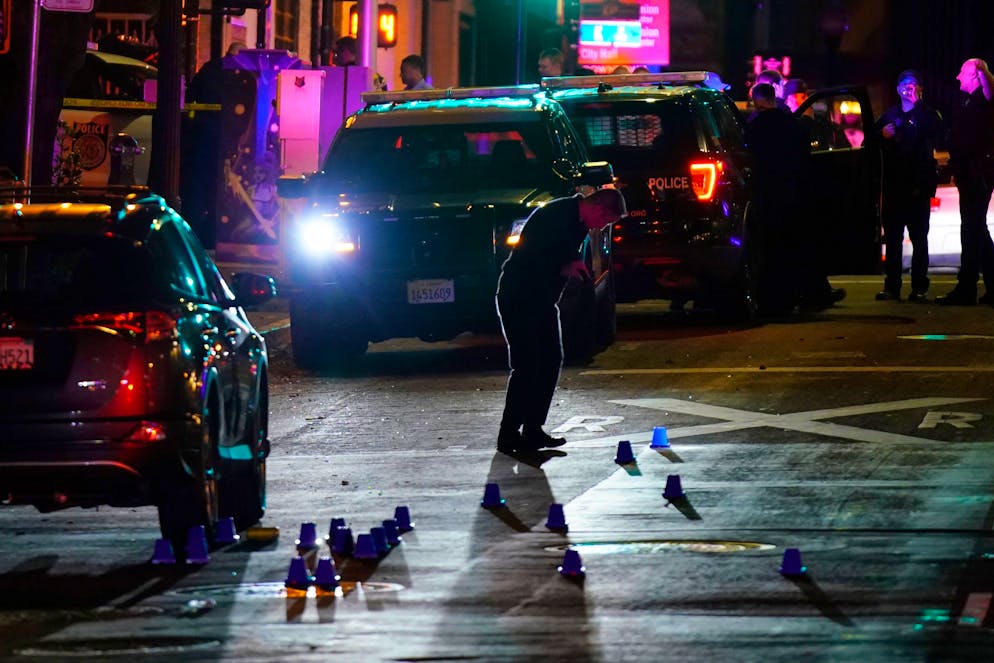 Investigators search for evidence in the area of a mass shooting In Sacramento, Calif. April 3, 2022. (AP Photo/Rich Pedroncelli)