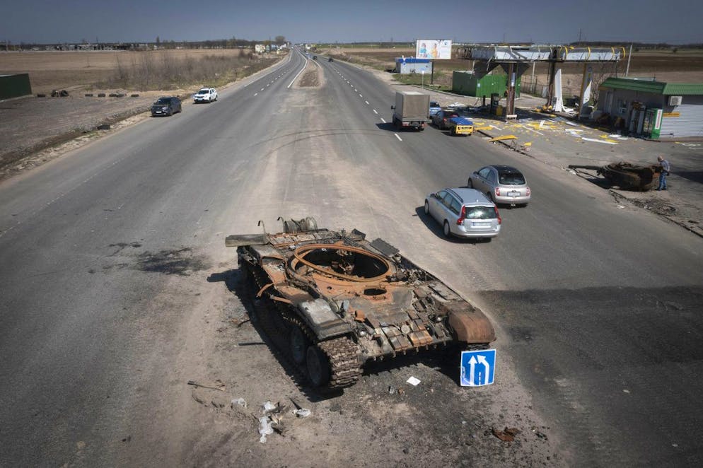 FILE -A Russian tank destroyed in recent fighting is seen on a road to Kyiv, Ukraine, Friday, April 15, 2022. (AP Photo/Efrem Lukatsky, File)