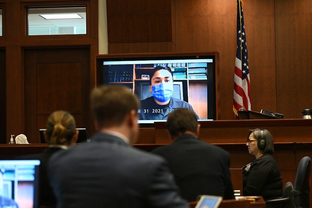 epa09910977 Officer Melissa Saenz testifies virtually in the courtroom at the Fairfax County Circuit Courthouse in Fairfax, Virginia, USA, 26 April 2022. Johnny Depp's 50 million US dollars defamation lawsuit against Amber Heard that started on 10 April is expected to last five or six weeks. EPA/BRENDAN SMIALOWSKI / POOL