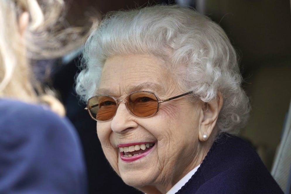 Britain's Queen Elizabeth II smiles as she attends at the Royal Windsor Horse Show, Windsor, England, Friday May 13, 2022. The Queen's appearance at the Royal Windsor Horse Show came a few days after she delegated the opening of Parliament to Prince Charles. (Steve Parsons/PA via AP)