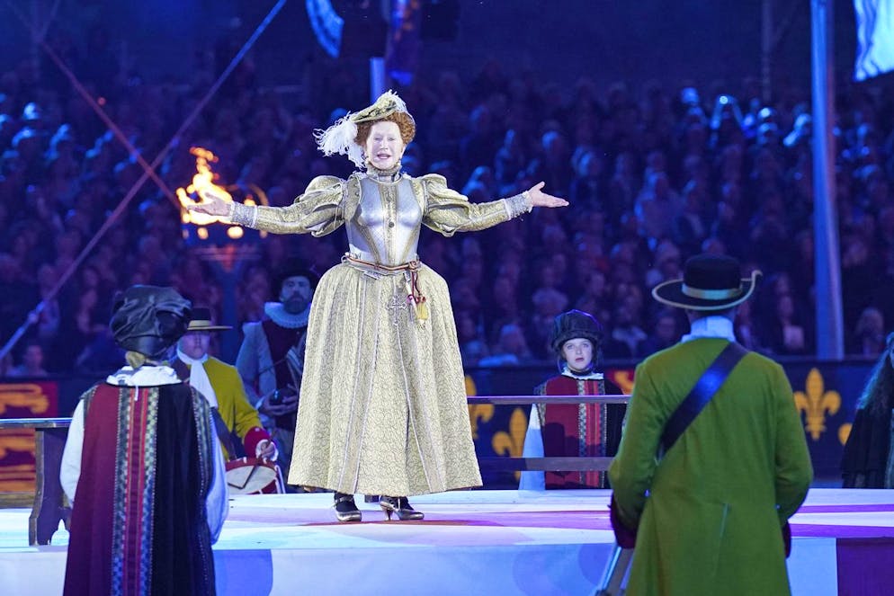 Dame Helen Mirren, dressed as Queen Elizabeth I, performs during the 