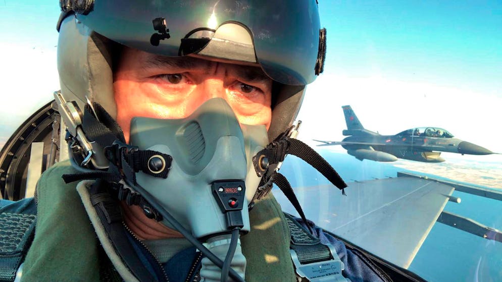 Turkey's Defense Minister Hulusi Akar sits inside an F-16 jet fighter at a military air base in western city of Eskisehir, Turkey, Wednesday, Sep. 2, 2020, during a training flight over Turkish Monument in Gallipoli peninsula. Akar said Thursday that Washington's lifting the arms embargo against Greek Cypriot-administered Cyprus will lead to a deadlock.