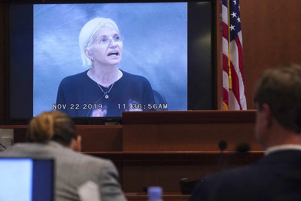 Actor Ellen Barkin testifies in a previously recorded video deposition at the Fairfax County Circuit Courthouse in Fairfax, Va., Thursday, May 19, 2022. Actor Johnny Depp sued his ex-wife Amber Heard for libel in Fairfax County Circuit Court after she wrote an op-ed piece in The Washington Post in 2018 referring to herself as a 