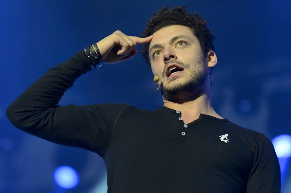 French humorist Kev Adams performs on the main stage during the 40th Paleo Festival in Nyon, Switzerland, Sunday, July 26, 2015. The Paleo open-air music festival, the largest in the western part of Switzerland, with 270'000 spectators in seven days, runs from 20 to 26 July 2015. (KEYSTONE/Laurent Gillieron)