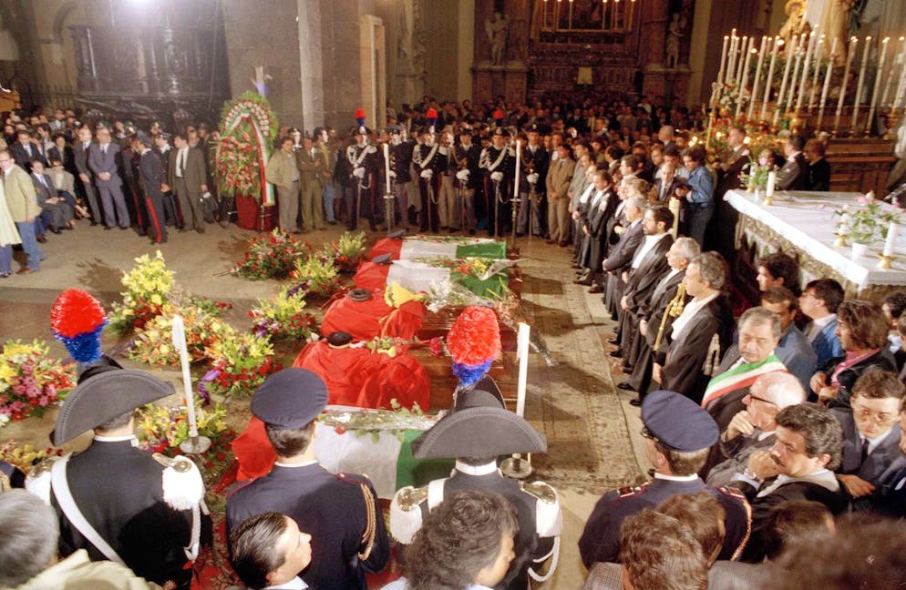 Inside the Palermo Cathedral during the funeral of Italy's top anti-Mafia fighter Giovanni Falcone, his wife and three policemen, May 25, 1992. The were killed in a bomb explosion on the highway near Palermo on Saturday. (AP Photo/Bruno Mosconi)