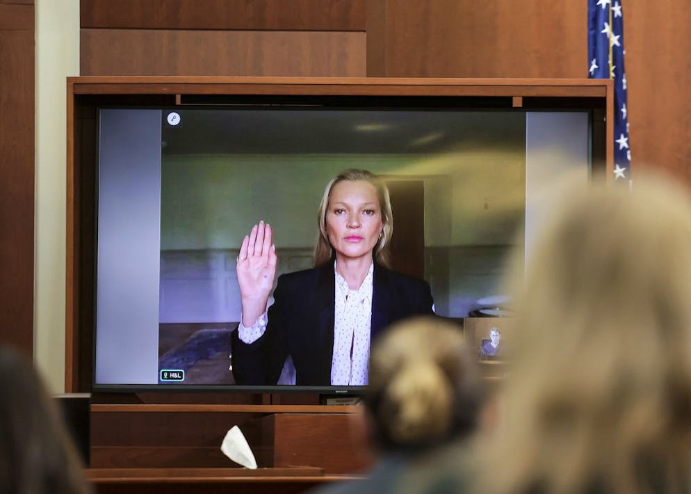 epa09974649 Model Kate Moss, a former girlfriend of actor Johnny Depp, is sworn in to testify via video link during Depp's defamation trial against his ex-wife Amber Heard, at the Fairfax County Circuit Courthouse in Fairfax, Virginia, USA, 25 May 2022. Johnny Depp's 50 million US dollar defamation lawsuit against Amber Heard started on 10 April. EPA/EVELYN HOCKSTEIN / POOL