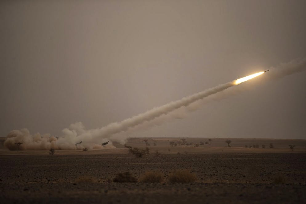 A launch truck fires the High Mobility Artillery Rocket System (HIMARS) at its intended target during the African Lion military exercise in Grier Labouihi complex, southern Morocco, Wednesday, June 9, 2021. With more than 7,000 participants from nine nations and NATO, African Lion is U.S. Africa Command's largest exercise. (AP Photo/Mosa'ab Elshamy)