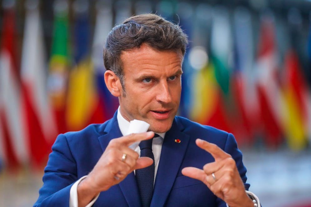 epa09987863 French President Emmanuel Macron speaks to the press at the end of the second day of the Special meeting of the European Council on Ukraine, in Brussels, Belgium, 31 May 2022. EPA/STEPHANIE LECOCQ