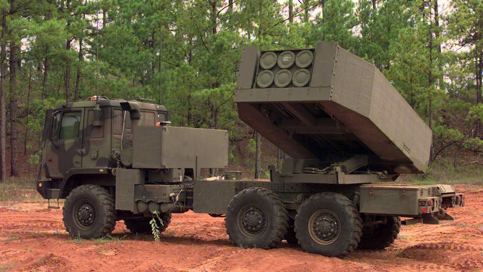 Soldiers from Charlie Company, 3/27 Field Artillery Regiment out of Fort Bragg, N.C., get ready to aim their High Mobility Artillery Rocket System (HIMARS) as part of the Rapid Force Projection Initiative Field Experiment (RFPI). This experiment is being used to test new equipment and its usefulness with the light forces in the field. (U.S. Army photo by Spc. Russell J. Good) (Released)