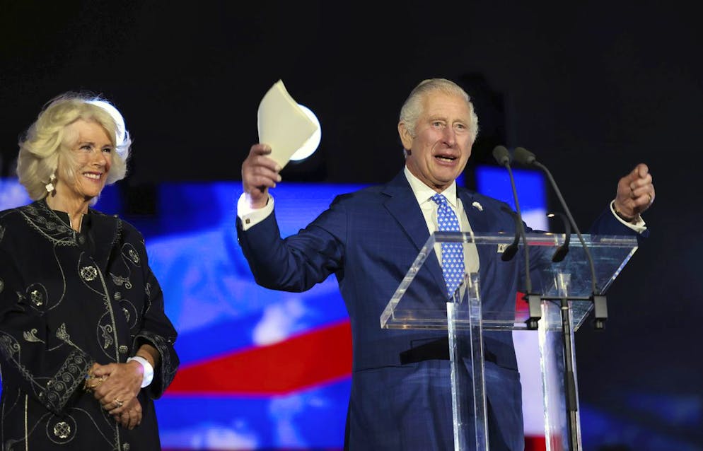 Britain's Prince Charles accompanied by Camilla, Duchess of Cornwall, speaks on the stage during the Platinum Jubilee concert taking place in London, Saturday June 4, 2022, on the third of four days of celebrations to mark the Platinum Jubilee. The events over a long holiday weekend in the U.K. are meant to celebrate Queen Elizabeth IIâÄ™s 70 years of service. (Jonathan Buckmaster/Pool Photo via AP)