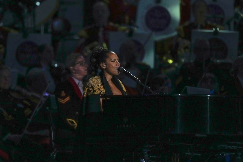 Alicia Keys performs at the Platinum Jubilee concert taking place in front of Buckingham Palace, London, Saturday June 4, 2022, on the third of four days of celebrations to mark the Platinum Jubilee. The events over a long holiday weekend in the U.K. are meant to celebrate Queen Elizabeth II's 70 years of service. (AP Photo/Alastair Grant, Pool)