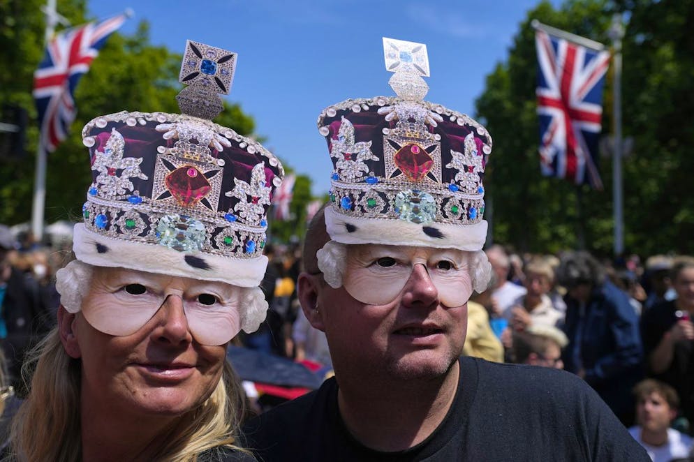 Royal fans gather on the Mall near Buckingham Palace, London, Saturday June 4, 2022 ahead of the Platinum Jubilee concert, on the third of four days of celebrations to mark the Platinum Jubilee. The events over a long holiday weekend in the U.K. are meant to celebrate Queen Elizabeth II's 70 years of service. (AP Photo/Frank Augstein)