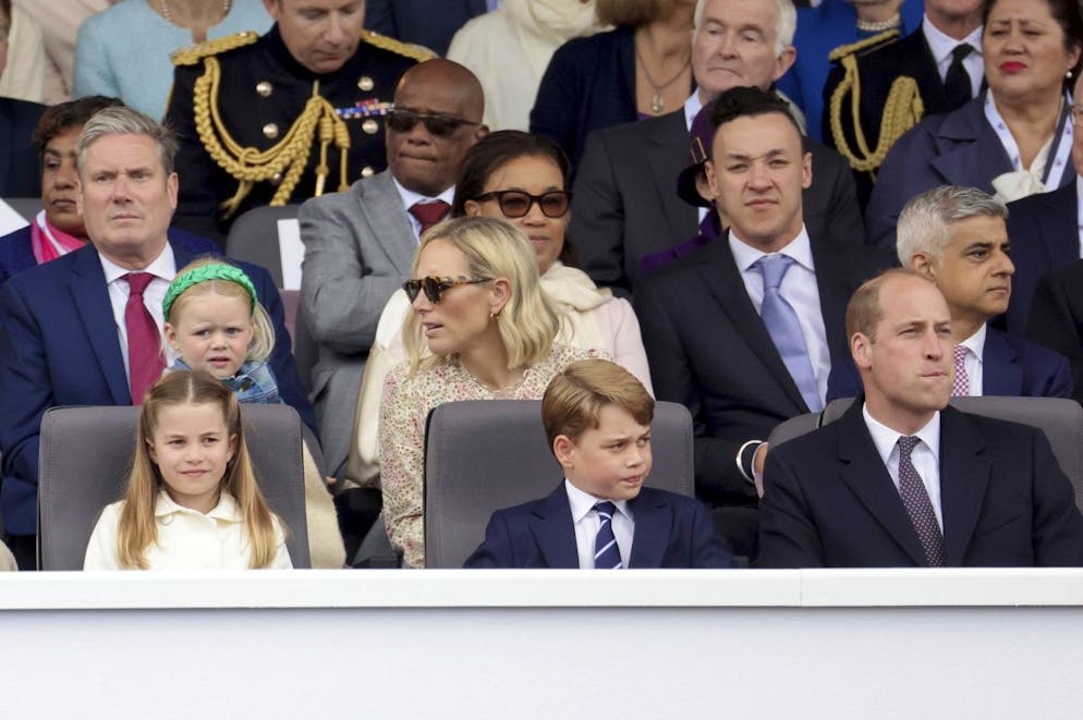 From left, Princess Charlotte, Prince George and Prince William watch the Platinum Jubilee Pageant, in London, Sunday June 5, 2022, on the last of four days of celebrations to mark the Platinum Jubilee. The pageant will be a carnival procession up The Mall featuring giant puppets and celebrities that will depict key moments from Queen Elizabeth IIâÄ™s seven decades on the throne. Keir Starmer sits at left in the second row. (Chris Jackson/Pool Photo via AP)