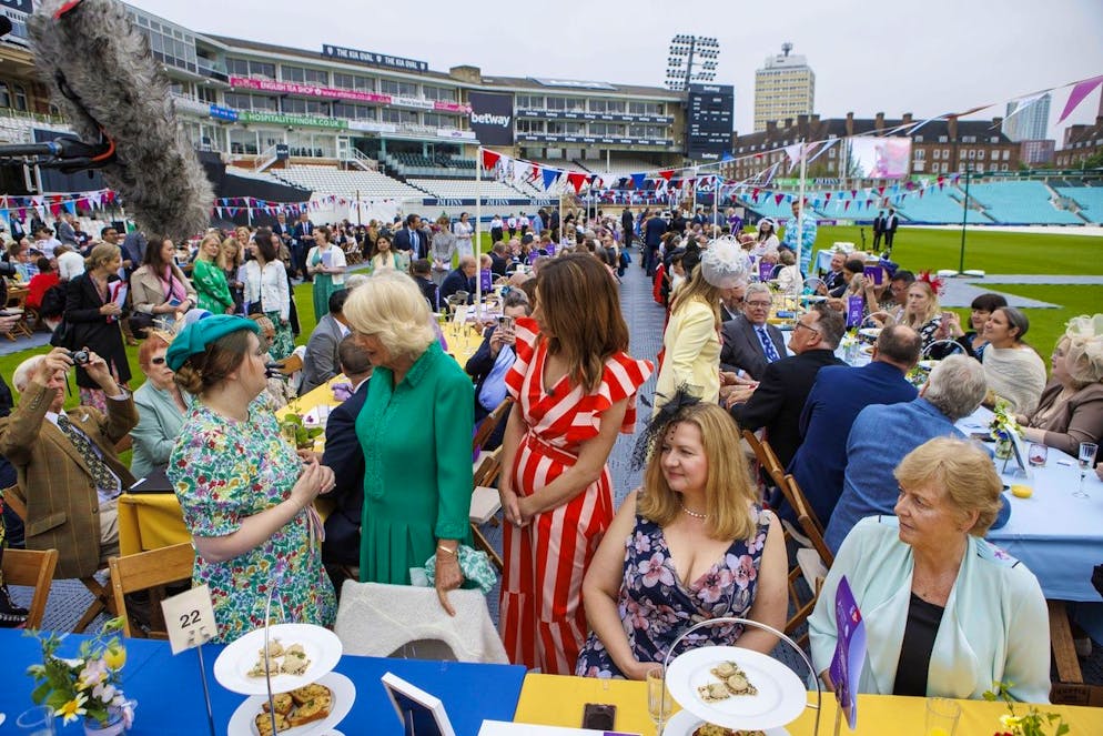 Camilla, Duchess of Cornwall, center left, as Patron of the Big Lunch, attend a Big Jubilee Lunch at The Oval, Kennington, in London, Sunday, June 5, 2022, on the last of four days of celebrations to mark Queen Elizabeth II's Platinum Jubilee. (Jamie Lorriman/Pool Photo via AP)