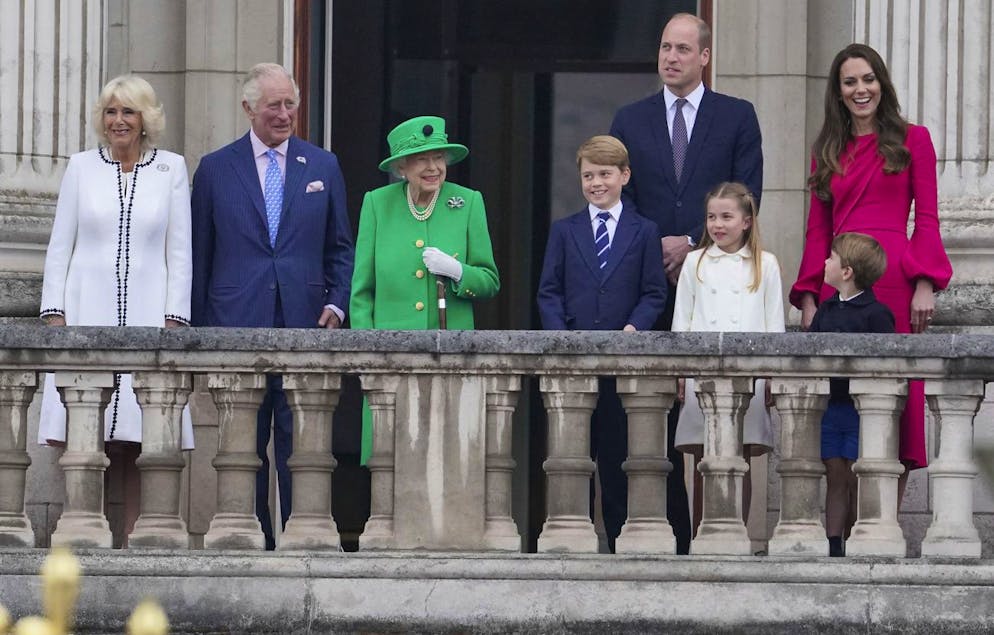 From left, Camilla Duchess of Cornwall, Prince Charles, Queen Elizabeth II, Prince George, Prince William, Princess Charlotte, Prince Louis, and Kate Duchess of Cambridge appear on the balcony of Buckingham Palace during the Platinum Jubilee Pageant outside Buckingham Palace in London, Sunday June 5, 2022, on the last of four days of celebrations to mark the Platinum Jubilee. The pageant will be a carnival procession up The Mall featuring giant puppets and celebrities that will depict key moments from the Queen Elizabeth IIâÄ™s seven decades on the throne. (Jonathan Brady/Pool Photo via AP)