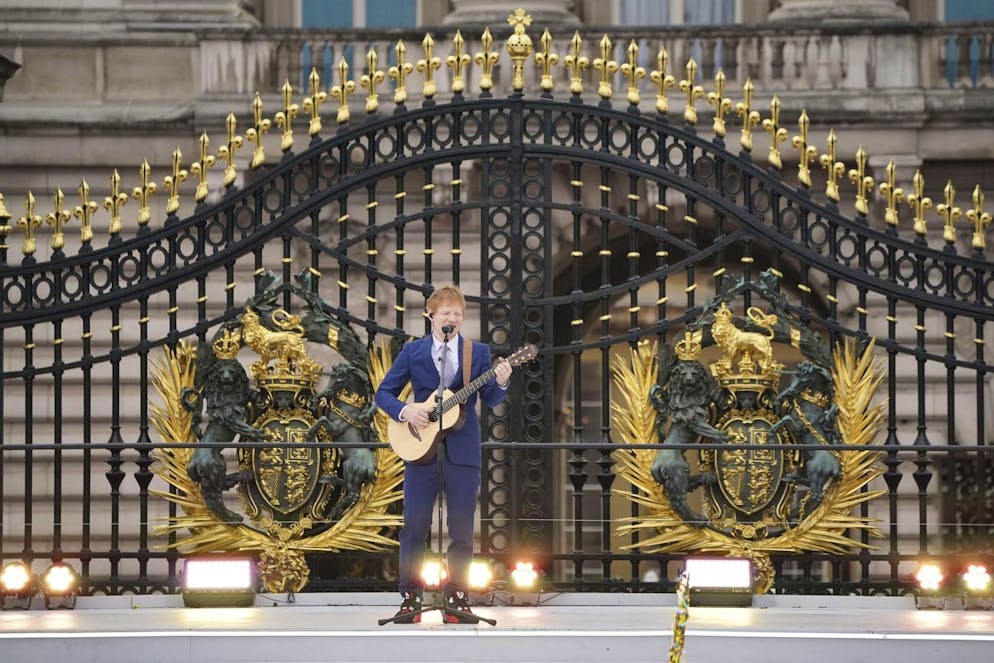 Ed Sheeran performs during the Platinum Jubilee Pageant outside Buckingham Palace in London, Sunday June 5, 2022, on the last of four days of celebrations to mark the Platinum Jubilee. The pageant will be a carnival procession up The Mall featuring giant puppets and celebrities that will depict key moments from the Queen Elizabeth IIâÄ™s seven decades on the throne. (Jonathan Brady/Pool Photo via AP)