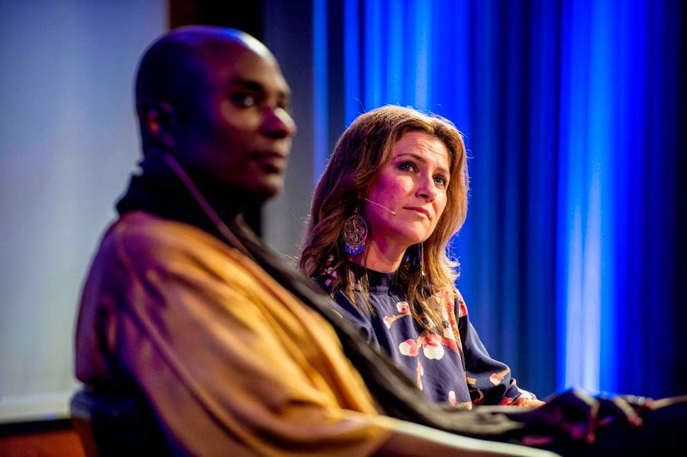 Norwegian princess Maertha poses on stage with shaman Durek Verrett (L) during a session at Clarion hotel in Stavanger, Norway, on May 20, 2019. (Photo by Carina Johansen / various sources / AFP) / Norway OUT (Photo credit should read CARINA JOHANSEN/AFP via Getty Images)