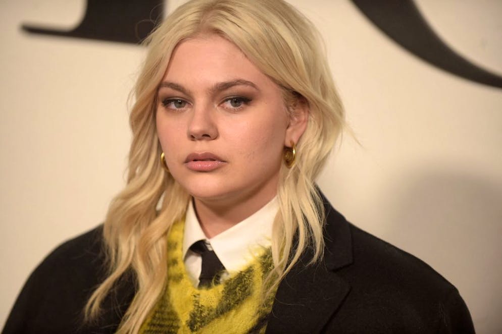 French actress and singer Louane poses for a photocall for the Christian Dior Fall-Winter 2022-2023 collection fashion show during the Paris Womenswear Fashion Week, in Paris, on March 1, 2022. (Photo by JULIEN DE ROSA / AFP) (Photo by JULIEN DE ROSA/AFP via Getty Images)