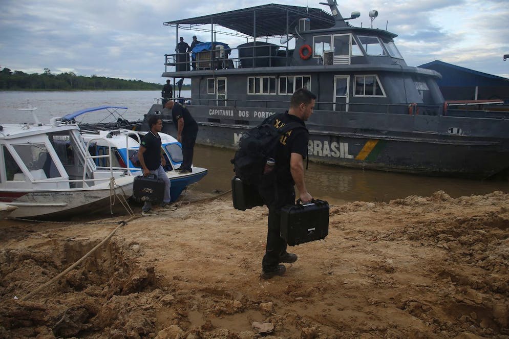 Federal police officers arrive at the pier after searching for Indigenous expert Bruno Pereira and freelance British journalist Dom Phillips in Atalaia do Norte, Amazonas state, Brazil, Tuesday, June 14, 2022. Brazilian police are still searching for Pereira and Phillips, who went missing in a remote area of Brazil's Amazon a week ago. (AP Photo/Edmar Barros)
