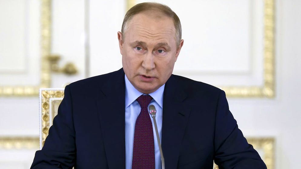 Russian President Vladimir Putin meets with business representatives on the development of the automobile industry on the sidelines of the St. Petersburg International Economic Forum in St. Petersburg, Russia, Thursday, June 16, 2022. (Alexander Ryumin, Sputnik, Kremlin Pool Photo via AP)