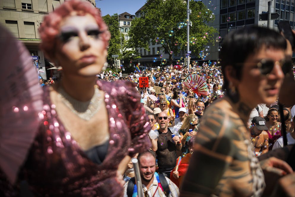 People demonstrate at the Zurich Pride parade with the slogan 