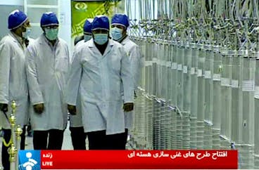 epa03107149 A grab taken from a video broadcast by the official Iranian state TV (IRIB) on 15 February 2012, shows centrifuges (R) at Iranian Natanz nuclear site. Iranian President Mahmoud Ahmadinejad 15 February inaugurated three new nuclear projects, in a ceremony that was broadcast live on state television network IRIB. 'This is another huge step in Iran's nuclear technology and this path should be decisively continued, and all the shouting, threats and intimidations by the West should be ignored,' Ahmadinejad said at the ceremony. At the Iranian Atomic Organization in Tehran, Ahmadinejad witnessed the insertion of the country's first domestically made nuclear fuel rods into a medical reactor. EPA/IRANIAN STATE TELEVISION IRIB / HANDOUT HANDOUT EDITORIAL USE ONLY/NO SALES