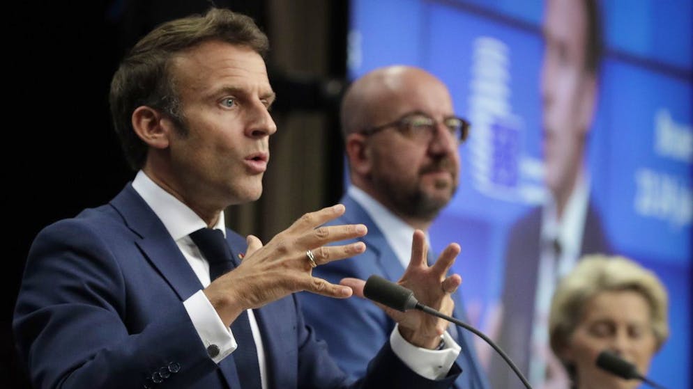 epa10030524 (L-R) French President Emmanuel Macron, European Council President Charles Michel and European Commission President Ursula von der Leyen gives a press conference on Ukraine, Moldova and Georgia EU accession during an EU Summit in Brussels, Belgium, 23 June 2022. European Council decided on EU candidate status to Ukraine and Moldova, and recognized he European perspective of Georgia, announced President of the Council Charles Michel on 23 June. EPA/OLIVIER HOSLET