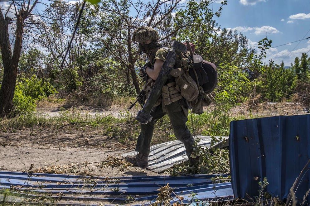 epa10026527 Ukrainian serviceman goes to a position in the city of Severodonetsk of Luhansk area, Ukraine 19 June 2022 (issued 21 June 2022). The city of Severodonetsk and its surroundings witnessed heavy fighting for the last days. Ukrainian troops control a part of city include the Azot plant where 568 people, including 38 children, remain in the bomb shelters, the head of the Luhansk Regional State Administration Serhiy Haidai said on June 21. On 24 February Russian troops entered Ukrainian territory starting a conflict that has provoked destruction and a humanitarian crisis. EPA/OLEKSANDR RATUSHNIAK
