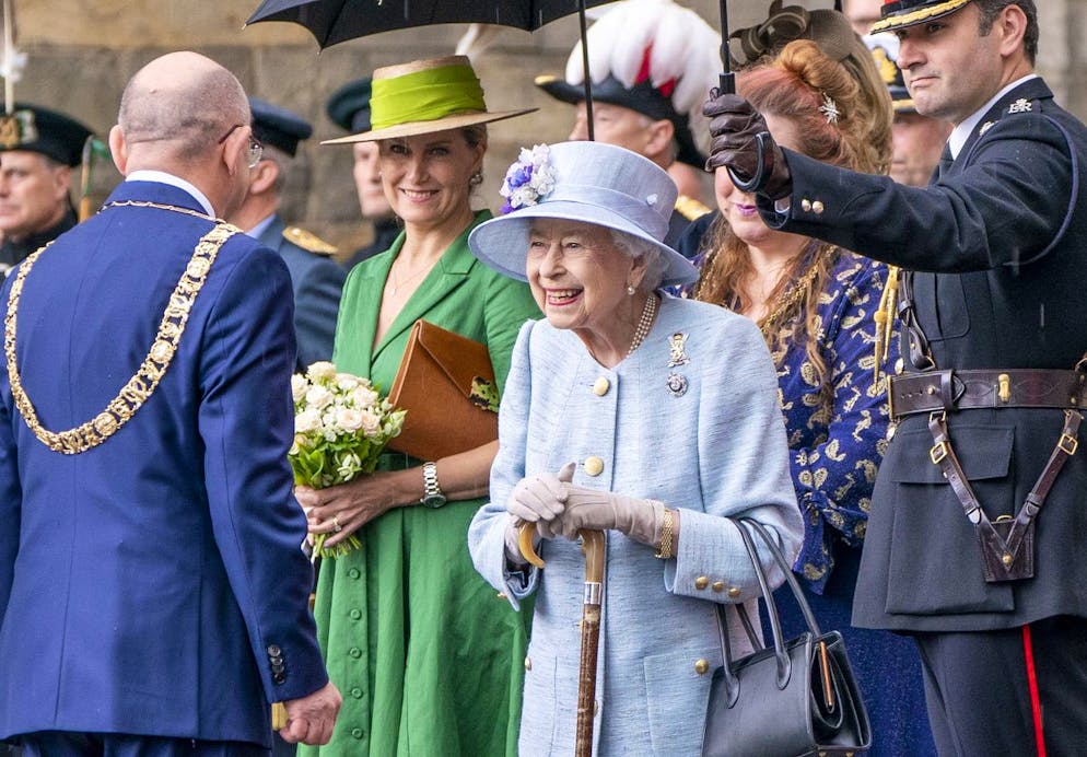Britain's Queen Elizabeth II is greeted as she attends the Ceremony of the Keys on the forecourt of the Palace of Holyroodhouse in Edinburgh, Monday, June 27, 2022, as part of her traditional trip to Scotland for Holyrood week. (Jane Barlow/PA via AP)
