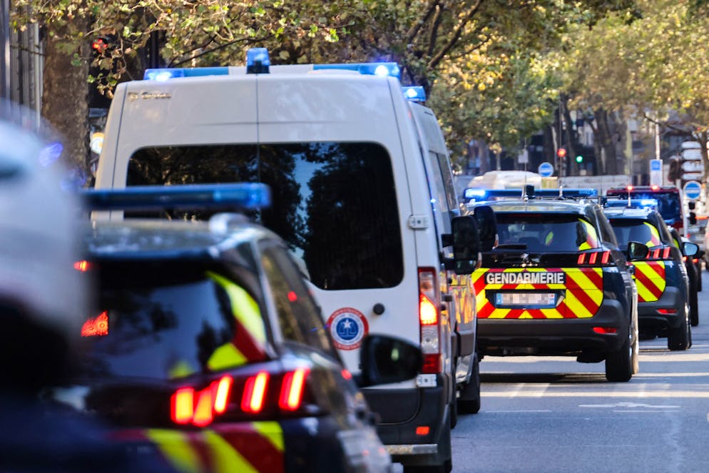 TOPSHOT - French Gendarmes escort a convoy understood to be transporting Salah Abdeslam, the prime suspect in the November 13, 2015 Paris attacks, from the Fleury-Merogis prison in the southern suburbs of Paris, to the Palais de Justice of Paris - Paris' courthouse, on September 8, 2021, for the start of the trial of the November 2015 Paris attacks' defendants. - The biggest trial in France's modern legal history begins on September 8, 2021 over the November 2015 attacks on Paris that saw 130 people killed at bars, restaurants and the Bataclan concert hall. The suicide bombing and gun assault by three teams of jihadists, planned from Syria and later claimed by the Islamic State group, was France's worst post-war atrocity. (Photo by Thomas COEX / AFP) (Photo by THOMAS COEX/AFP via Getty Images)