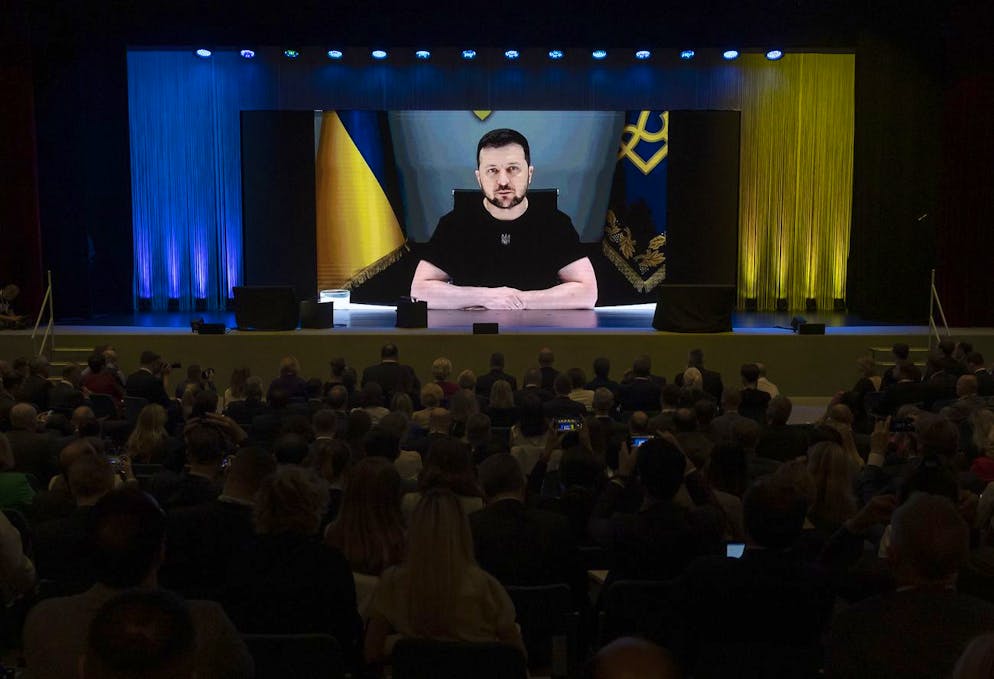 Ukrainian President Volodymyr Zelenskyy delivers a speech by video conference during the Ukraine Recovery Conference URC, Monday, July 4, 2022 in Lugano, Switzerland. The URC is organised to initiate the political process for the recovery of Ukraine after the attack of Russia to its territory. (KEYSTONE/Swiss Federal Department of Foreign Affairs FDFA/Michael Buholzer)