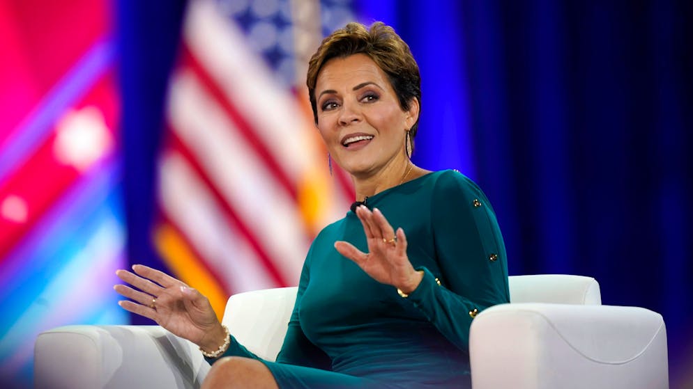 Kari Lake, Republican candidate for Arizona governor, speaks on stage at the Conservative Political Action Conference (CPAC) in Dallas, Friday, Aug. 5, 2022. (AP Photo/LM Otero)