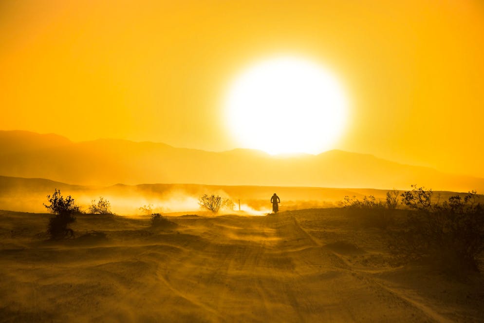A desert camping trip in the Anza Borrego Occotillo Wells region of the California desert. RV’s, motorcycles, and dune buggies gather together in a community.