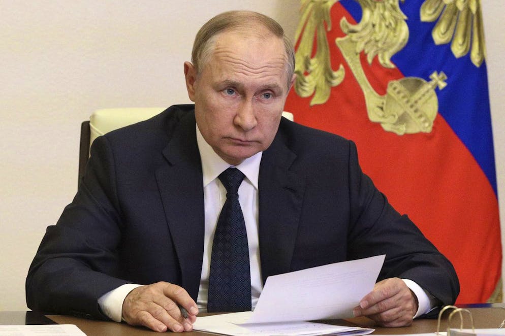 Russian President Vladimir Putin chairs a meeting on fighting forest fires via video conference call at the Novo-Okaryovo State House outside Moscow, Wednesday, Aug. 24, 2022.