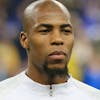 France's Djibril Sidibe pays attention to the national anthem of Colombia prior to a friendly soccer match between France and Colombia in Saint-Denis, outside Paris, Friday March 23, 2018. (AP Photo/Michel Euler)