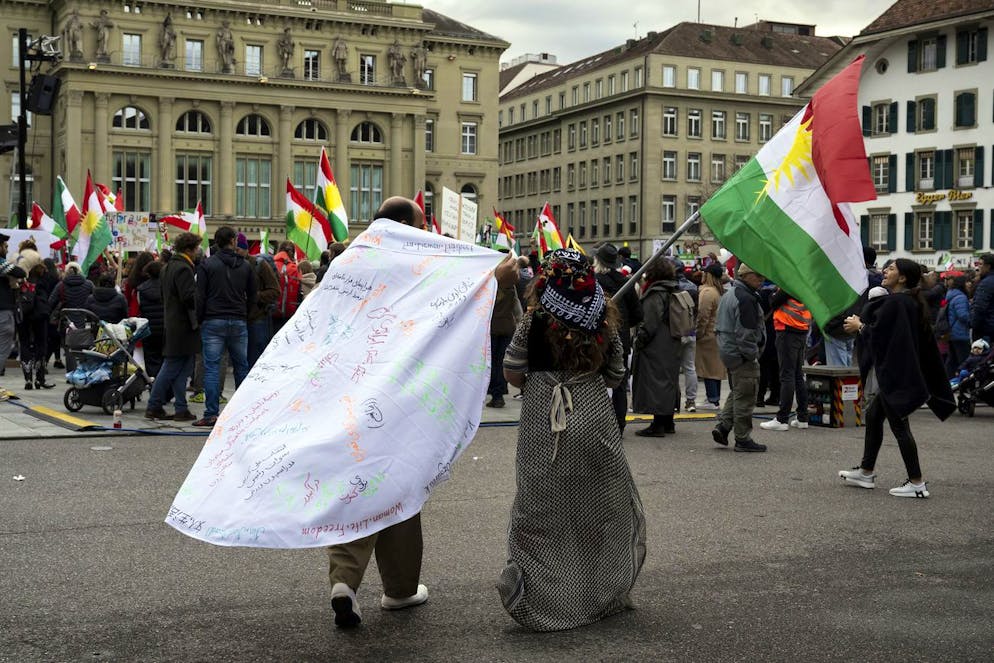 Protesters take part in a freedom rally for Iranian Women, on the Federal Square (Bundesplatz) in Bern, Switzerland, on Saturday, November 5, 2022. After the death of Mahsa Amini the Iranian people, especially women and youth, are taking to the streets to protest against the cruel treatment of the population. The demonstrators in hundreds of cities are facing repression from the government authorities. For several weeks, the protesters have been demanding that the government respect the most basic human rights. (KEYSTONE/Anthony Anex)