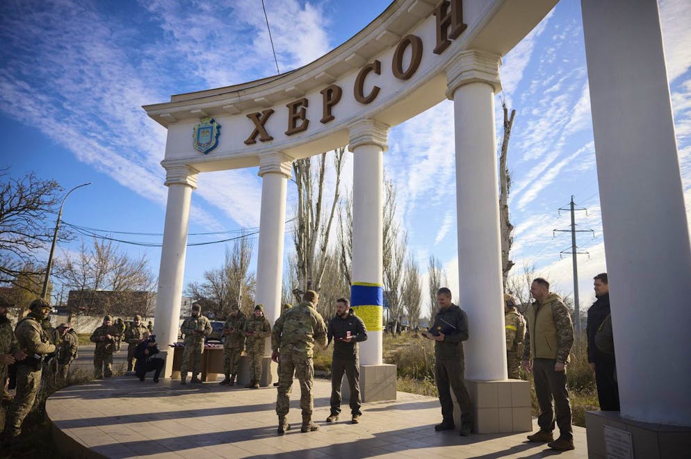 In this photo provided by the Ukrainian Presidential Press Office and posted on Facebook, Ukrainian President Volodymyr Zelenskyy, center right, awards a serviceman during his visit to Kherson, Ukraine, Monday, Nov. 14, 2022. Ukraine's retaking of Kherson was a significant setback for the Kremlin and it came some six weeks after Russian President Vladimir Putin annexed the Kherson region and three other provinces in southern and eastern Ukraine âÄ” in breach of international law âÄ” and declared them Russian territory. (Ukrainian Presidential Press Office via AP)