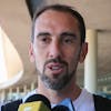 epa10300381 The Uruguayan soccer team player Diego Godin speaks with the press upon arrival at Carrasco International Airport to leave for Doha for the Qatar 2022 World Cup in Montevideo, Uruguay, 11 November 2022. EPA/Raul Martinez