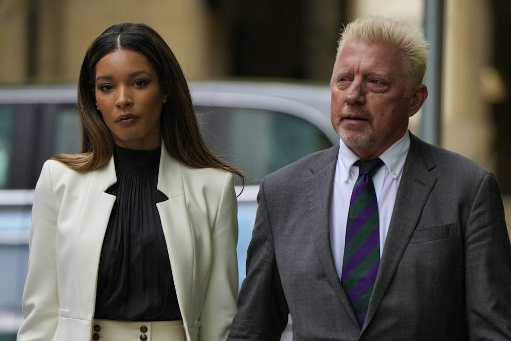 Former Tennis player Boris Becker with Lilian de Carvalho Monteiro as they arrive at Southwark Crown Court for sentencing in London, Friday, April 29, 2022. Becker was found guilty earlier of dodging his obligation to disclose financial information to settle his debts.(AP Photo/Alastair Grant)