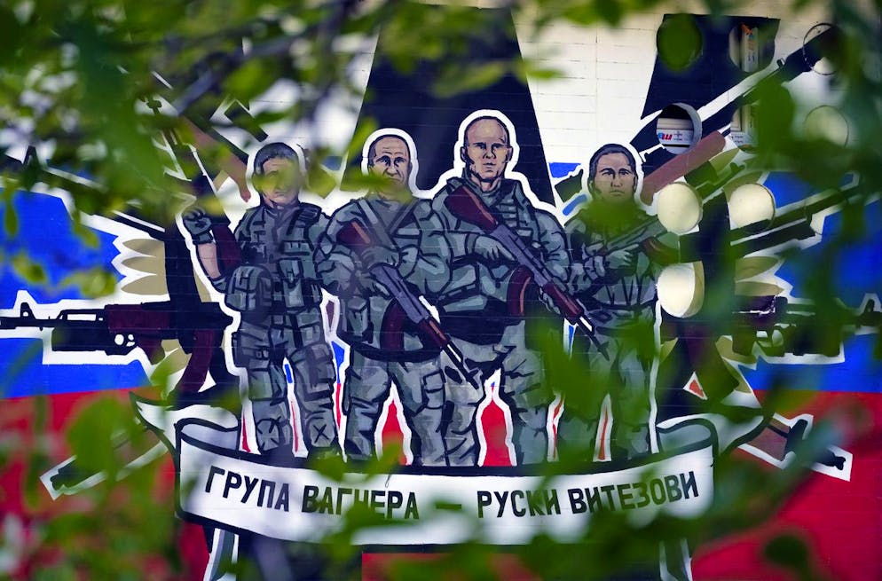 Une peinture murale représentant des mercenaires du groupe russe Wagner sur laquelle on peut lire : «Groupe Wagner - chevaliers russes». (image d'illustration)