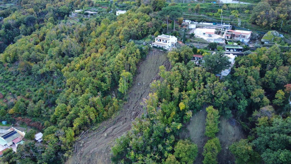 epa10332679 An aerial view of the devastation caused by the landslide in Casamicciola, Ischia Island, Italy, 27 November 2022. Italy has declared state of emergency following the deadly landslide on Ischia Island which has left  10 people missing and at least 2 dead.  EPA/Ciro Fusco ITALY OUT