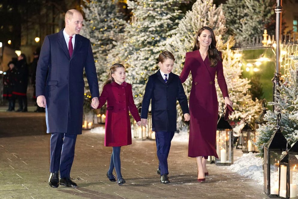 Britain's Prince William and Kate, Princess of Wales arriving with their children Princess Charlotte and Prince George for the 'Together at Christmas' Carol Service at Westminster Abbey in London, Thursday, Dec. 15, 2022. (James Manning/PA via AP)