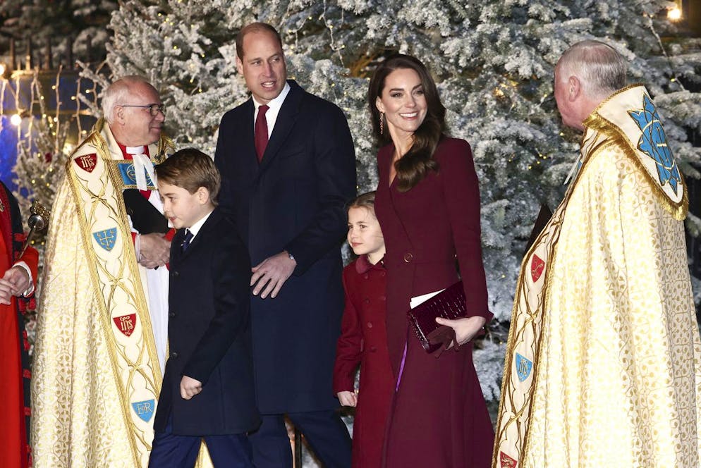 Britain's Prince William, Prince of Wales, Kate, Princess of Wales, Prince George and Princess Charlotte attend the 'Together At Christmas' carol service at Westminster Abbey, in London, Thursday, Dec. 15, 2022. (Henry Nicholls/Pool Photo via AP)