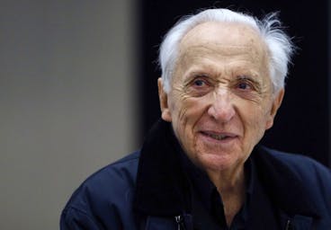 epa10267053 (FILE) - French artist Pierre Soulages poses for photographs in front of one of his paintings on display during the exhibition 'The Outrenoir(s) of Pierre Soulages: European Museums and Foundations' at the new Soulages Museum in Rodez, France, 28 May 2014 (reissued 26 October 2022). Pierre Soulages died at the age 102, according to a statement from the mayor of his hometown Rodez on 26 October 2022. EPA/GUILLAUME HORCAJUELO *** Local Caption *** 51391079