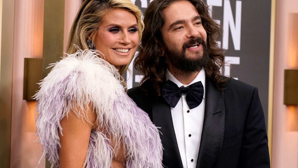 Heidi Klum (l) und Tom Kaulitz kommen zur Verleihung der 80. Golden Globe Awards in Beverly Hills. Foto: Jordan Strauss/Invision/AP/dpa